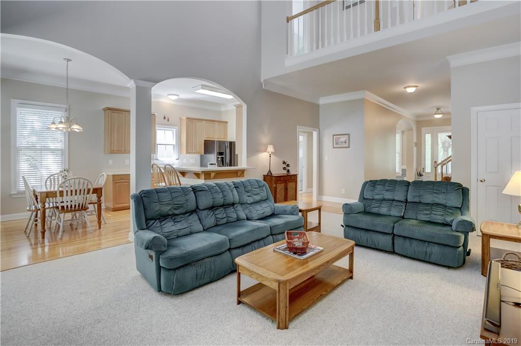 779 Julia Street Fort Mill, SC 29708 - Photo 14 of 48 a living room with furniture and a large window