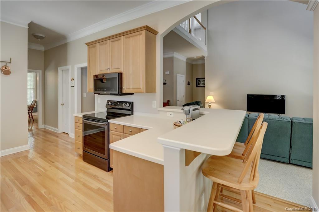 779 Julia Street Fort Mill, SC 29708 - Photo 17 of 48 a kitchen with a table and chairs in it