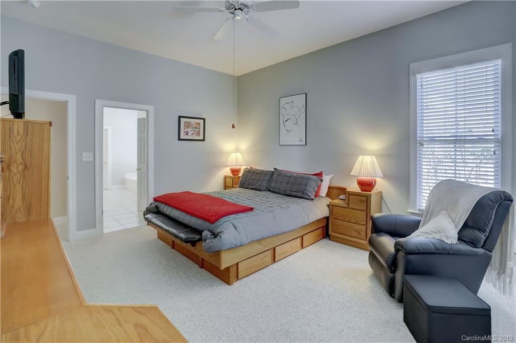 779 Julia Street Fort Mill, SC 29708 - Photo 22 of 48 a bedroom with a bed couch and window