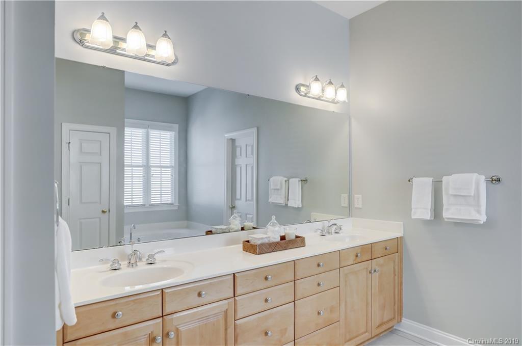779 Julia Street Fort Mill, SC 29708 - Photo 24 of 48 a bathroom with a sink double vanity and a mirror