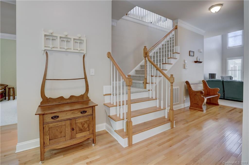 779 Julia Street Fort Mill, SC 29708 - Photo 28 of 48 a view of entryway and hall with wooden floor