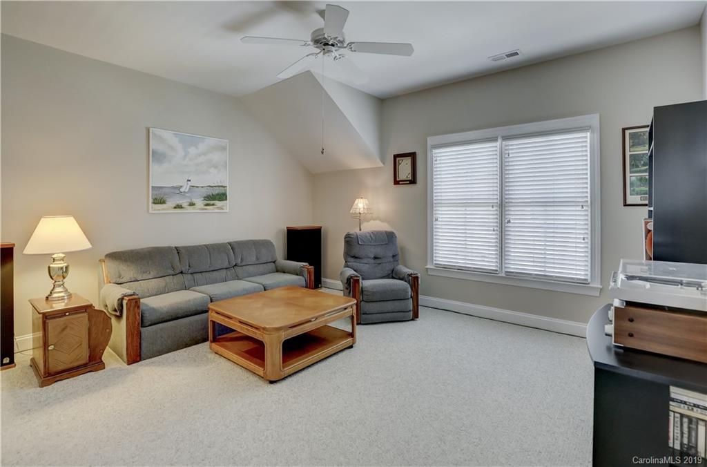 779 Julia Street Fort Mill, SC 29708 - Photo 30 of 48 a living room with furniture and a flat screen tv