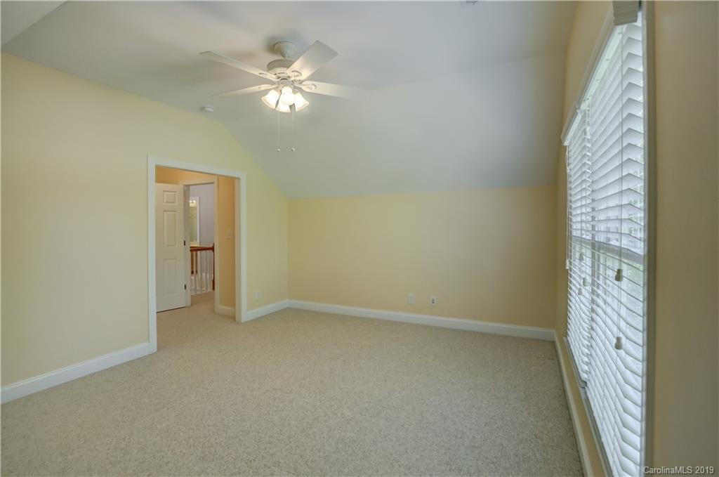 779 Julia Street Fort Mill, SC 29708 - Photo 33 of 48 a view of an empty room and chandelier fan