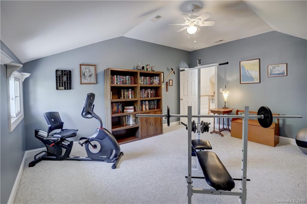 779 Julia Street Fort Mill, SC 29708 - Photo 41 of 48 a view of a livingroom with workspace and a couch