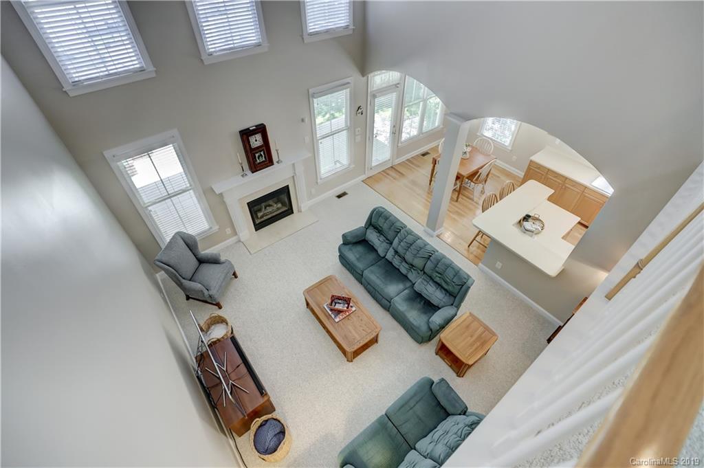 779 Julia Street Fort Mill, SC 29708 - Photo 42 of 48 a view of living room with furniture and floor to ceiling window