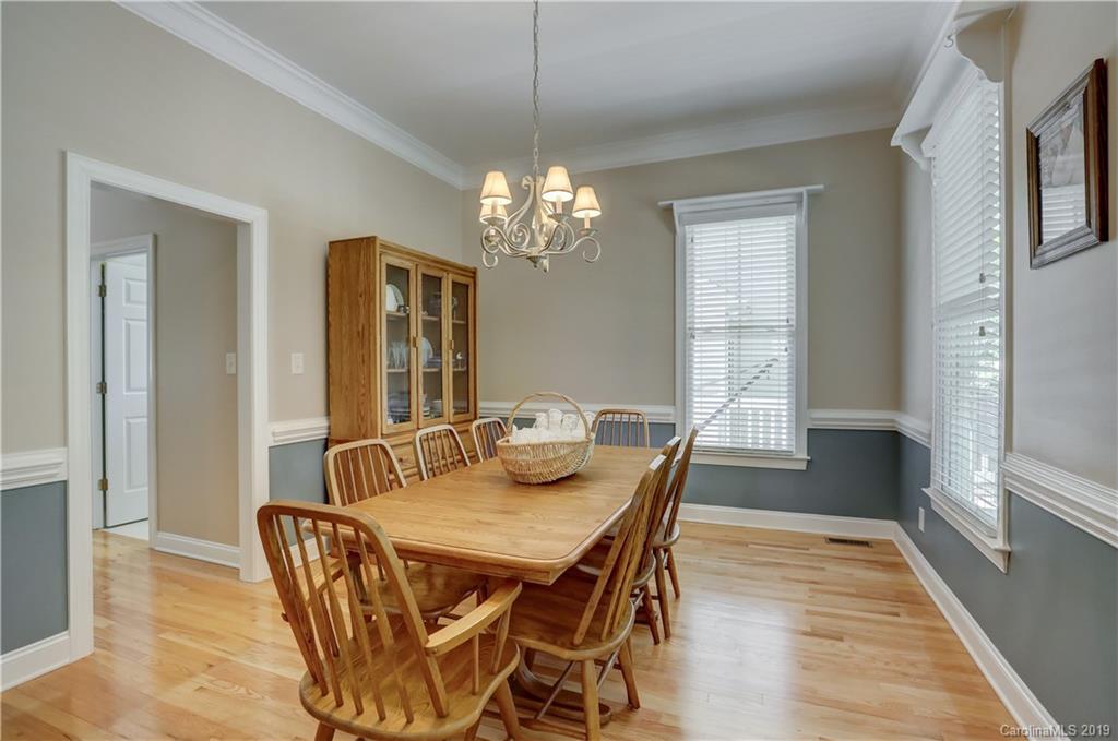 779 Julia Street Fort Mill, SC 29708 - Photo 6 of 48 a view of a dining room with furniture window and wooden floor