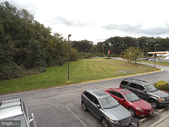 a view of a pool with a yard