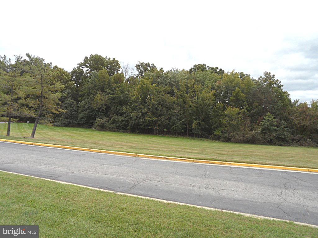 12513 Laurel Bowie Road Laurel, MD 20708 - Photo 17 of 22 a view of a tennis court
