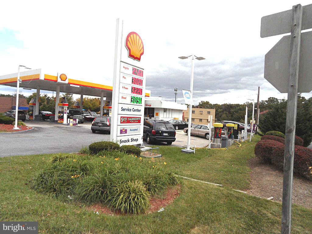 12513 Laurel Bowie Road Laurel, MD 20708 - Photo 4 of 22 a view of a street with cars parked