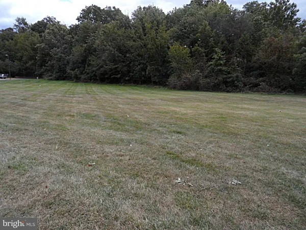 a view of swimming pool with seating space