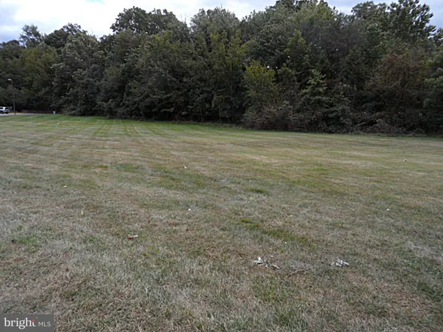 a view of swimming pool with seating space