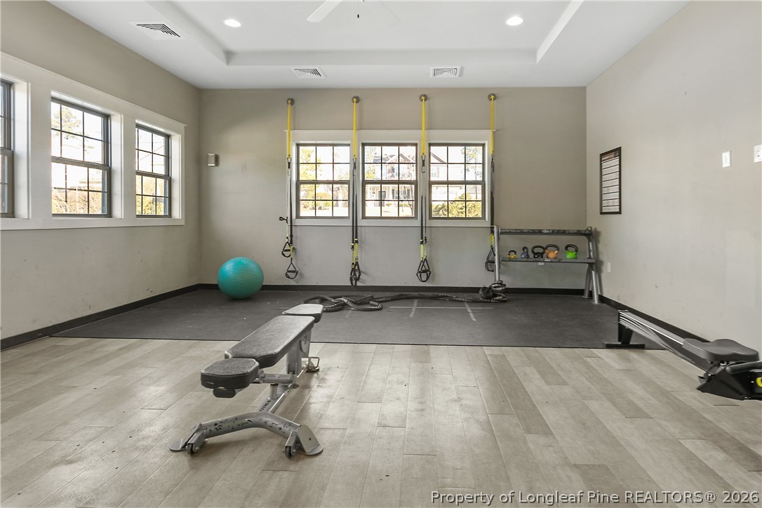 47 Pinnacle Drive Spring Lake, NC 28390 - Photo 45 of 50 a view of a room with gym equipment and a window