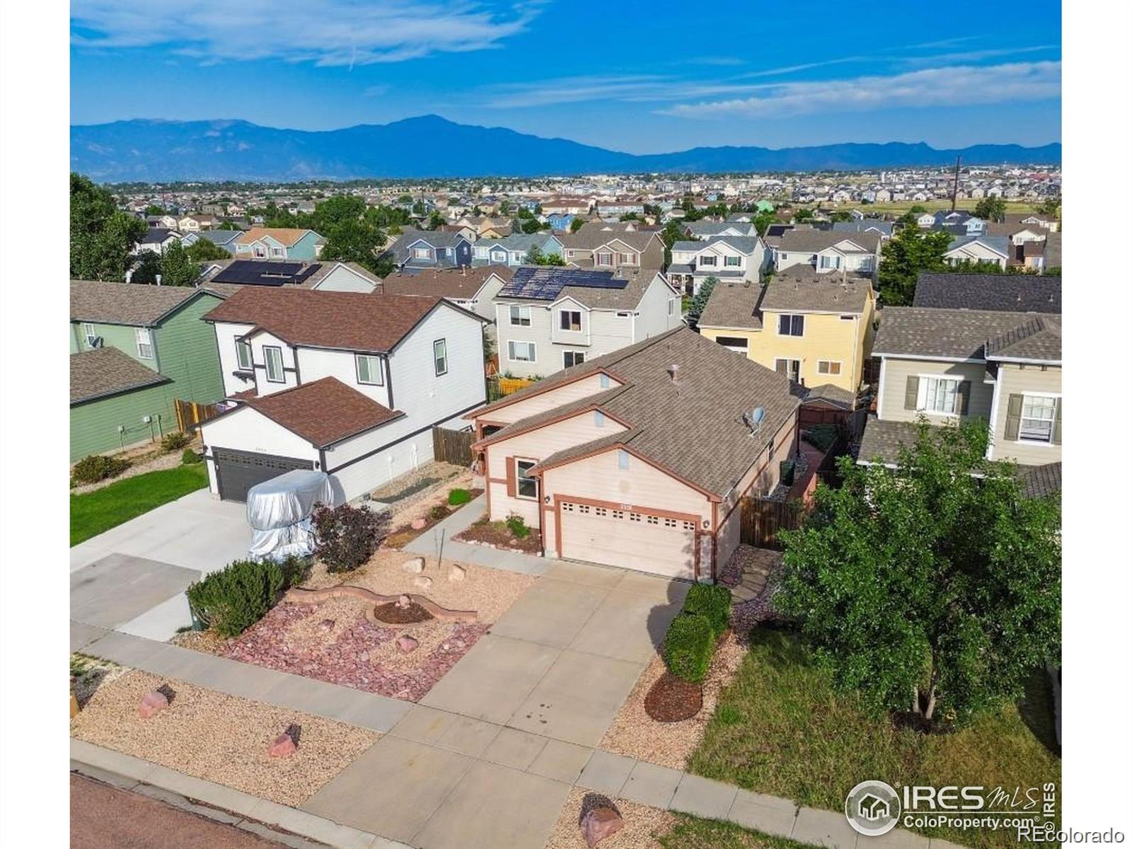 2338 Jeanette Way Colorado Springs, CO 80951 - Photo 1 of 18 an aerial view of residential houses with outdoor space