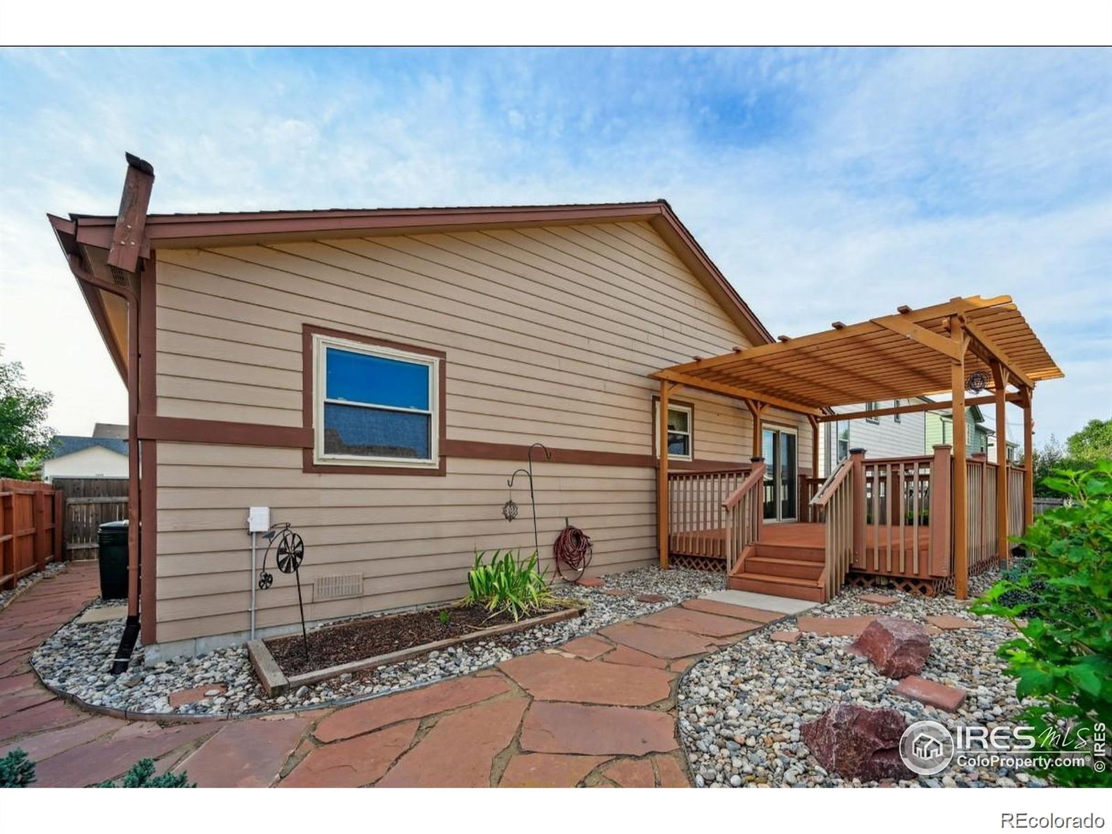 2338 Jeanette Way Colorado Springs, CO 80951 - Photo 13 of 18 a backyard of a house with barbeque oven