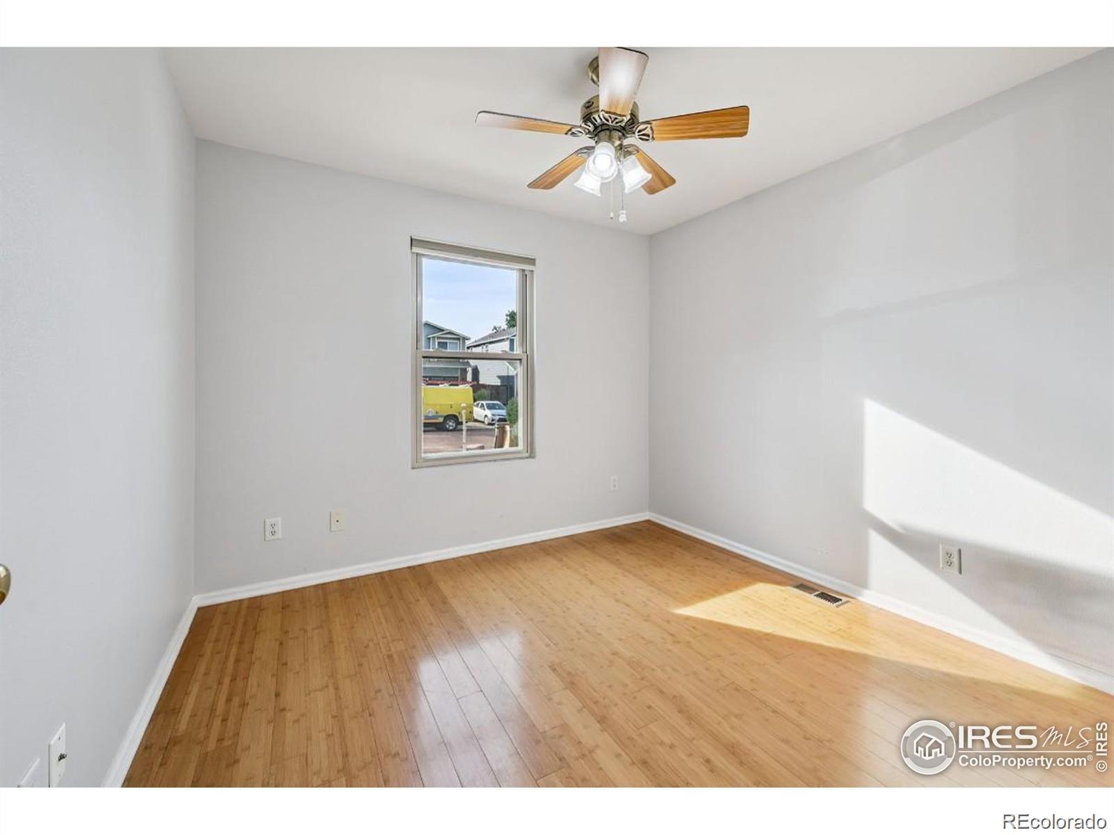 2338 Jeanette Way Colorado Springs, CO 80951 - Photo 5 of 18 a view of an empty room with a window
