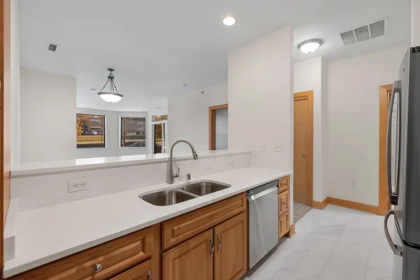 $295,000 | N74W13737 Appleton Avenue, Unit 107, Menomonee Falls, WI 53051