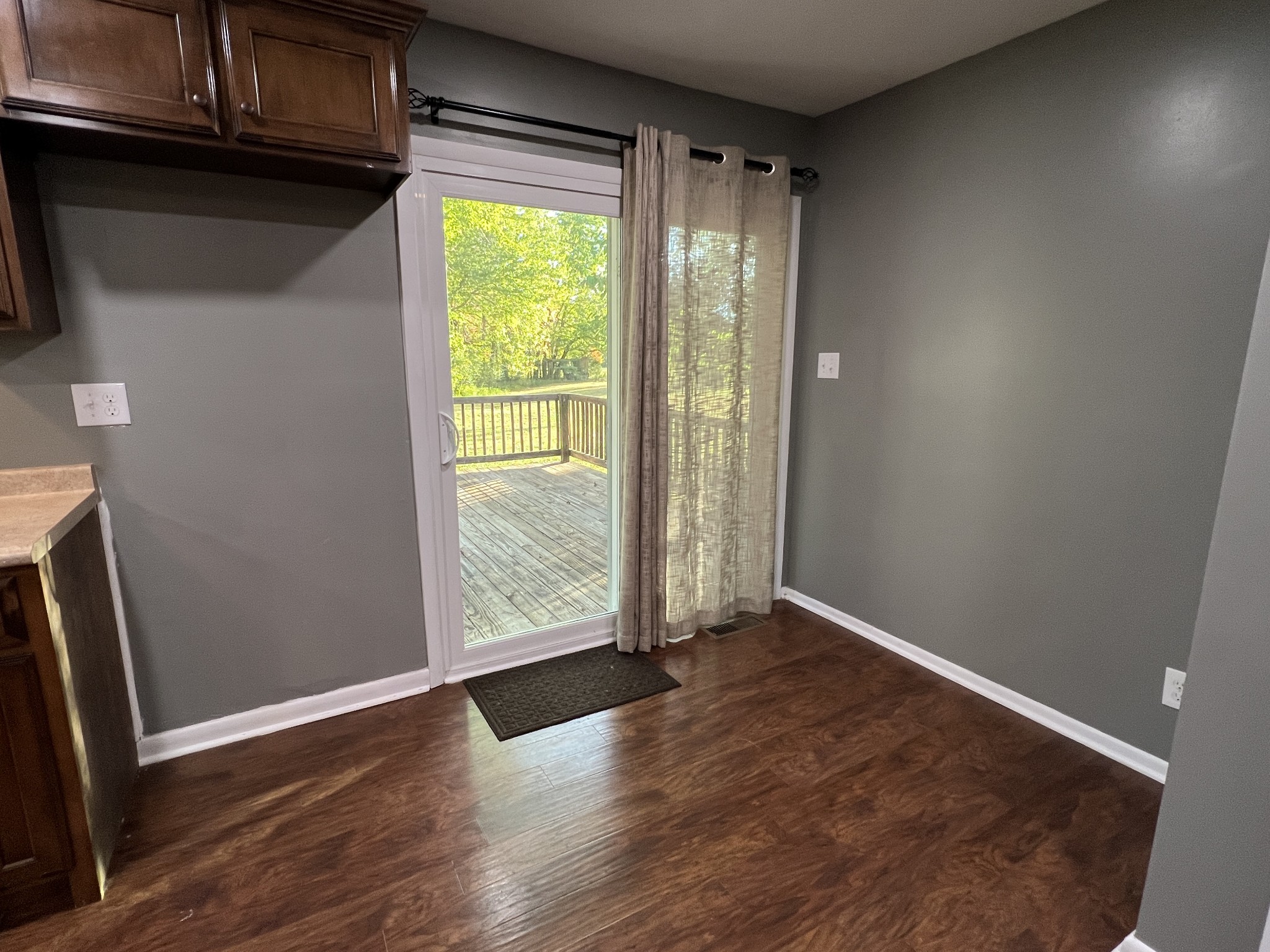 3019 Friendship Road Cross Plains, TN 37049 - Photo 11 of 39 an empty room with wooden floor and a window