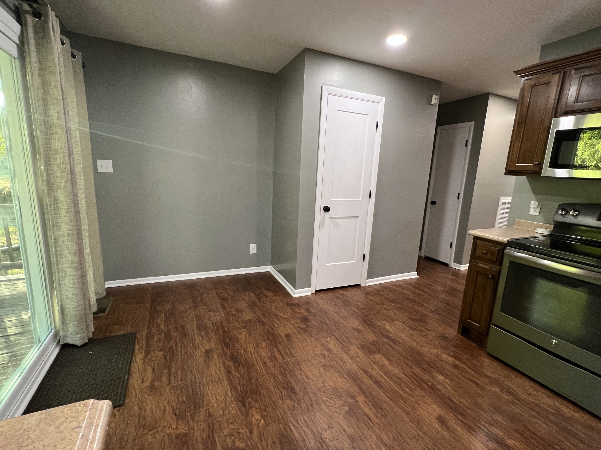 3019 Friendship Road Cross Plains, TN 37049 - Photo 15 of 39 an empty room with wooden floor and a window