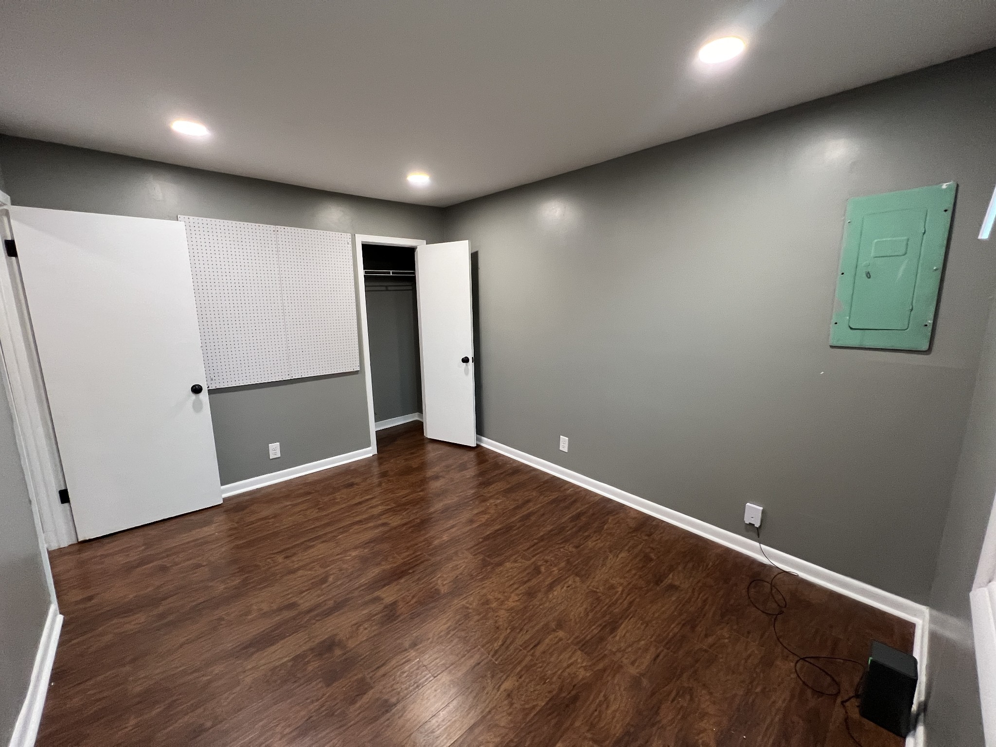 3019 Friendship Road Cross Plains, TN 37049 - Photo 19 of 39 a view of an empty room with wooden floor and a window