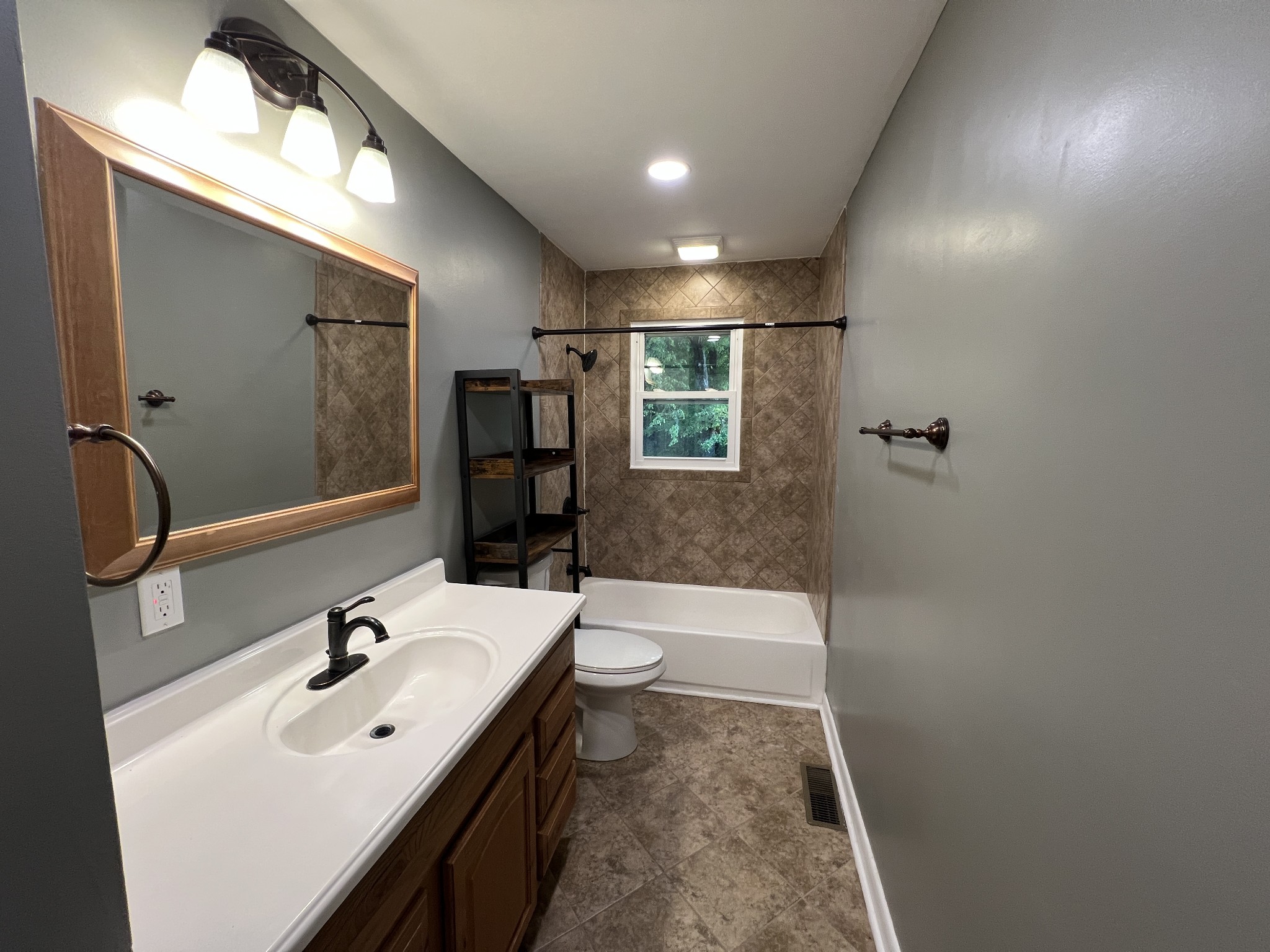 3019 Friendship Road Cross Plains, TN 37049 - Photo 21 of 39 a bathroom with a sink a toilet and shower