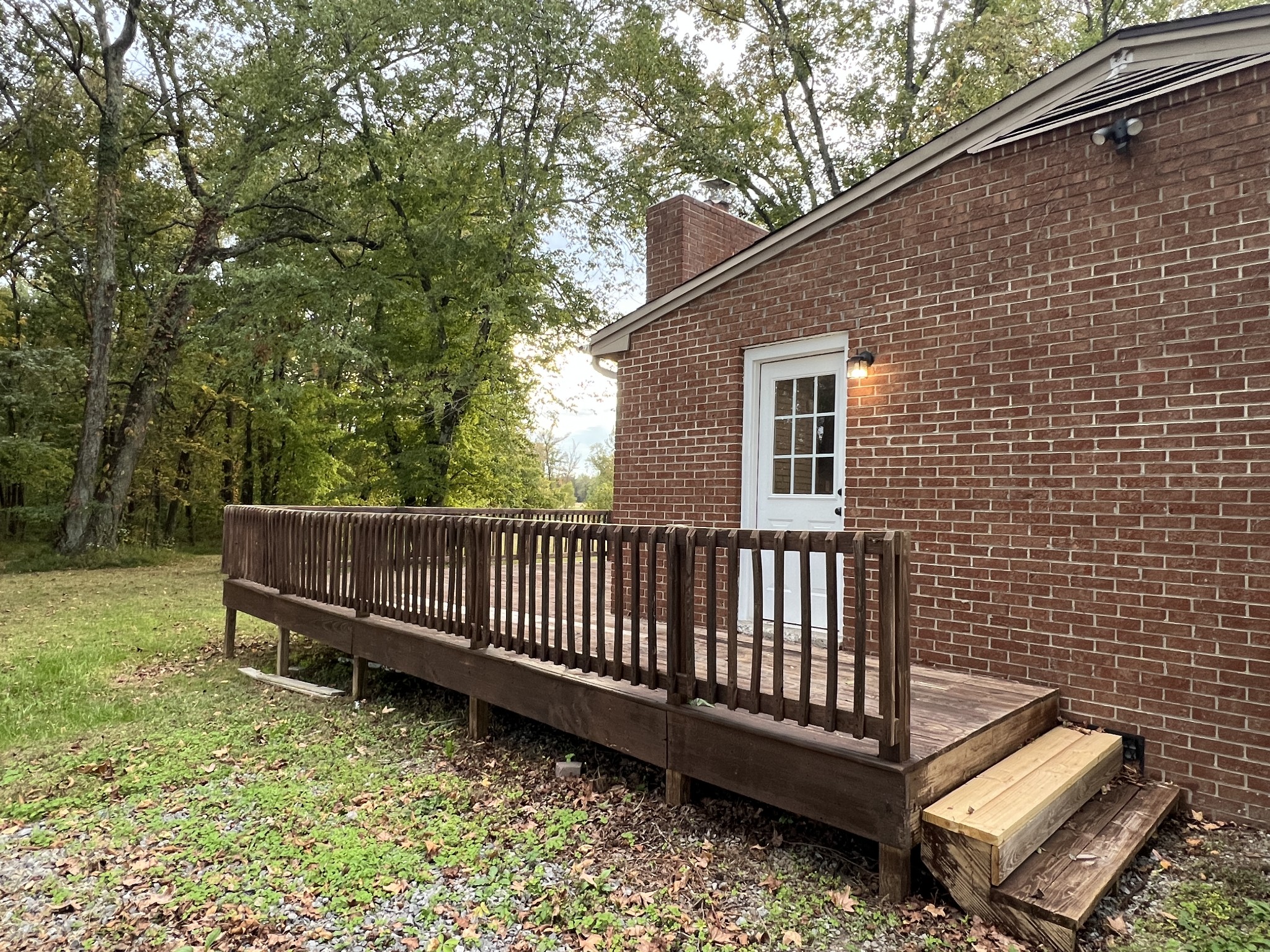 3019 Friendship Road Cross Plains, TN 37049 - Photo 30 of 39 a view of a backyard with a large tree