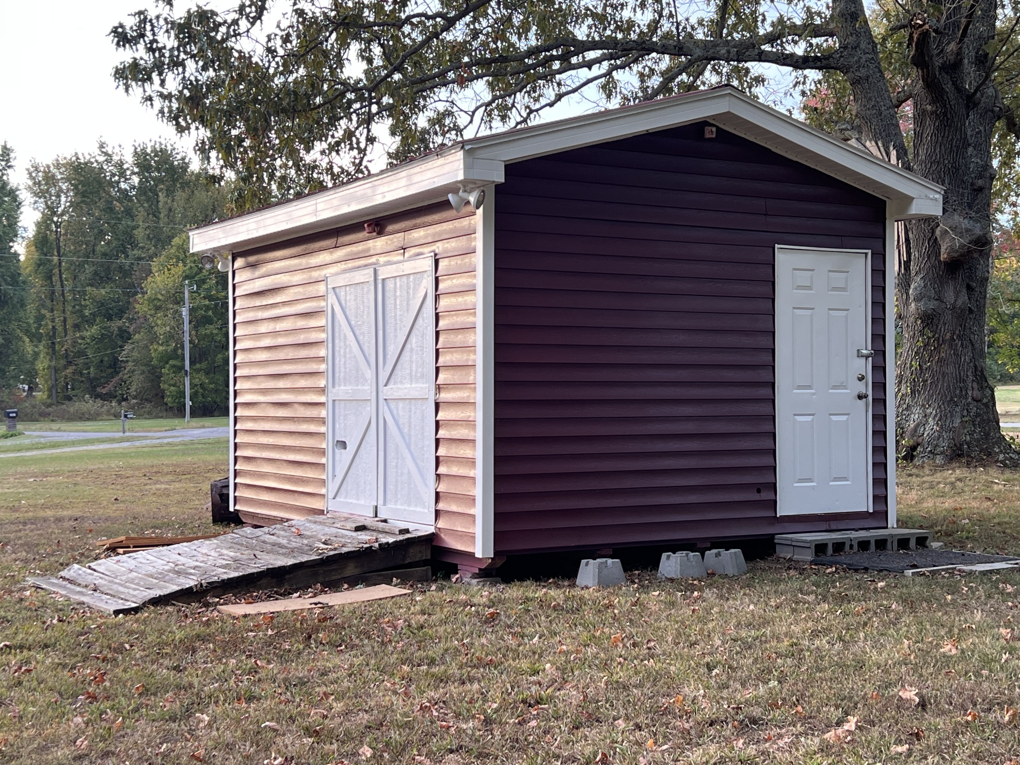 3019 Friendship Road Cross Plains, TN 37049 - Photo 33 of 39 a front view of a house with a garden