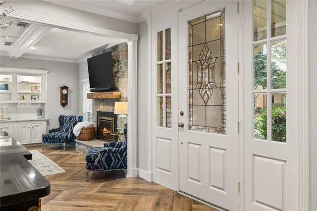 a view of a livingroom with furniture and a window