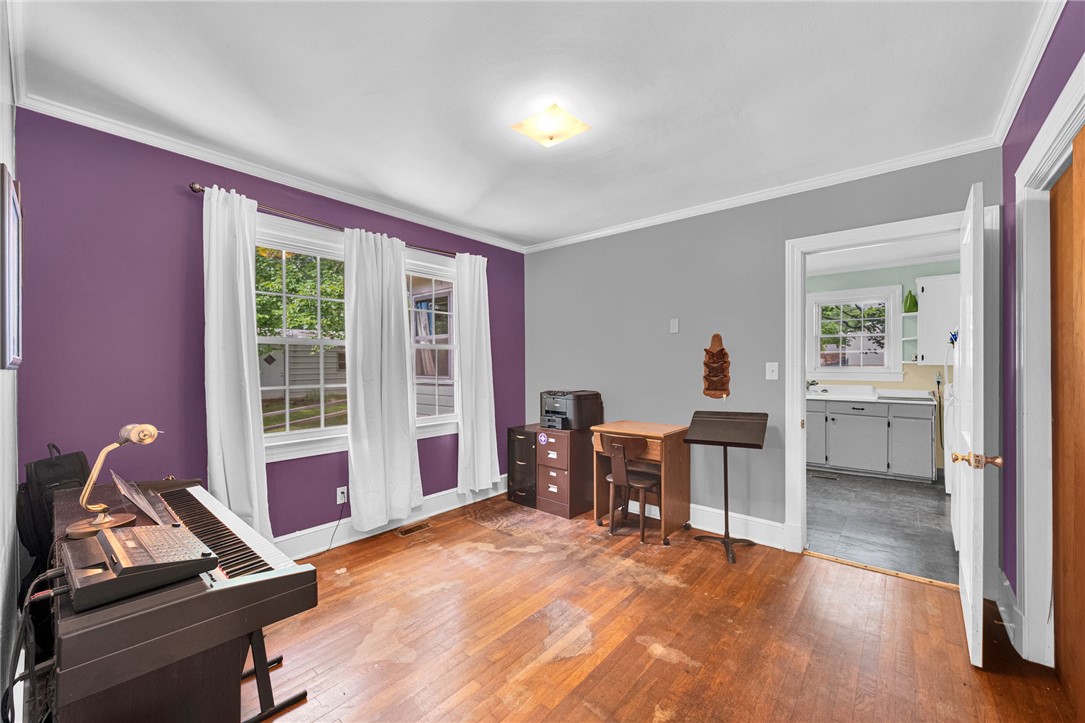 102 Graham Honea Path, SC 29654 - Photo 16 of 29 Hardwood floors and generous natural light create an inviting atmosphere in this versatile living space, CB 3rd bedroom, has closet.