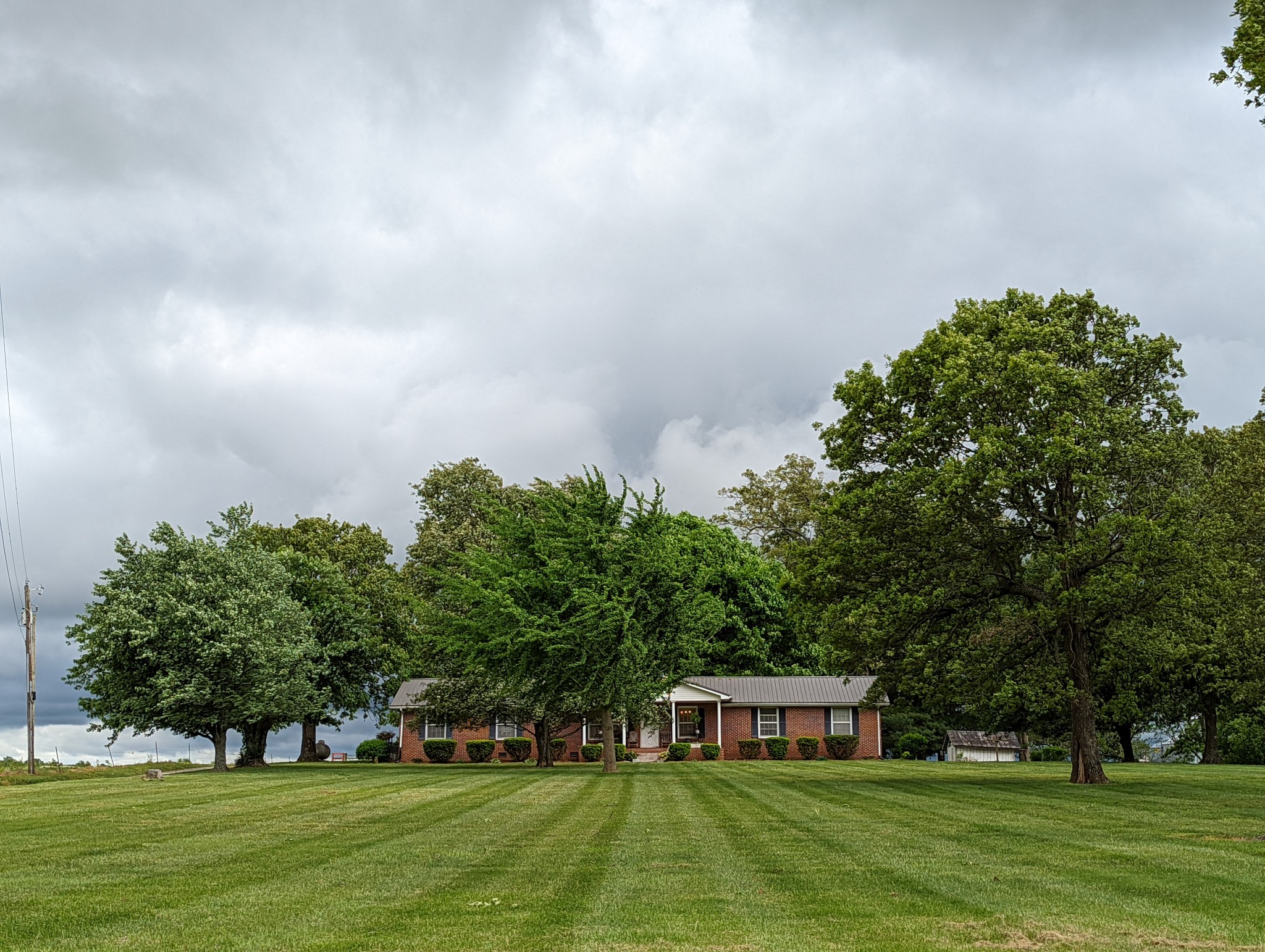 6765 Highland Road Portland, TN 37148 - Photo 24 of 31 a front view of a house with a garden