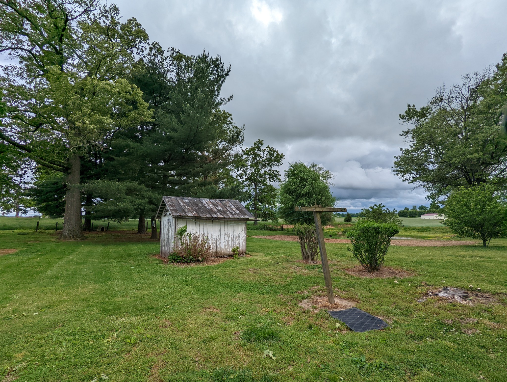 6765 Highland Road Portland, TN 37148 - Photo 27 of 31 a backyard of a house with lots of green space