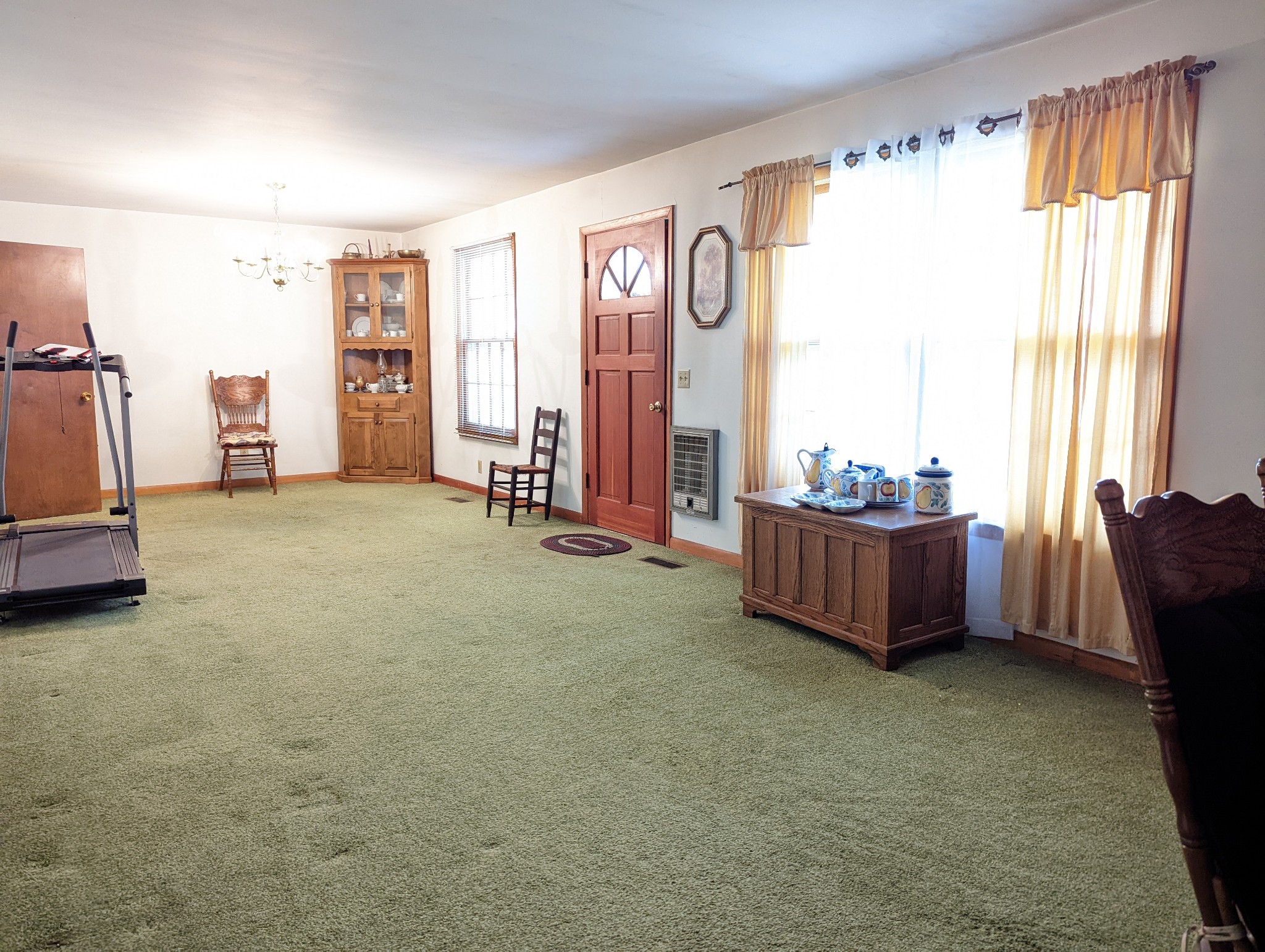 6765 Highland Road Portland, TN 37148 - Photo 6 of 31 a view of a room with gym equipment and a large window