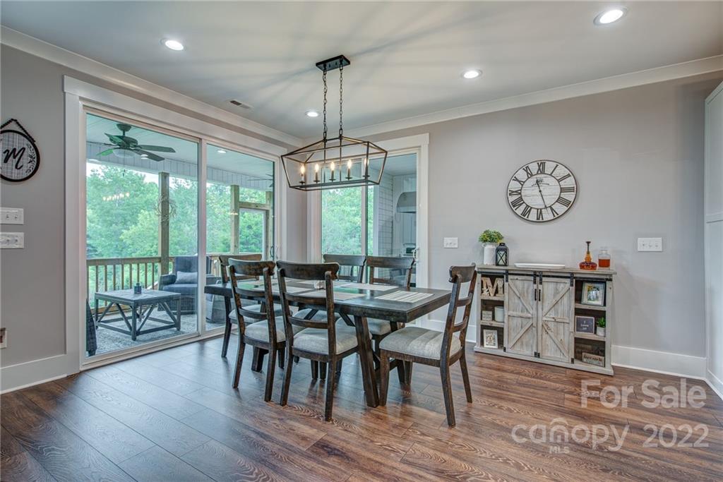 1388 Lawrence Road Clover, SC 29710 - Photo 20 of 48 a view of a dining room with furniture window and wooden floor