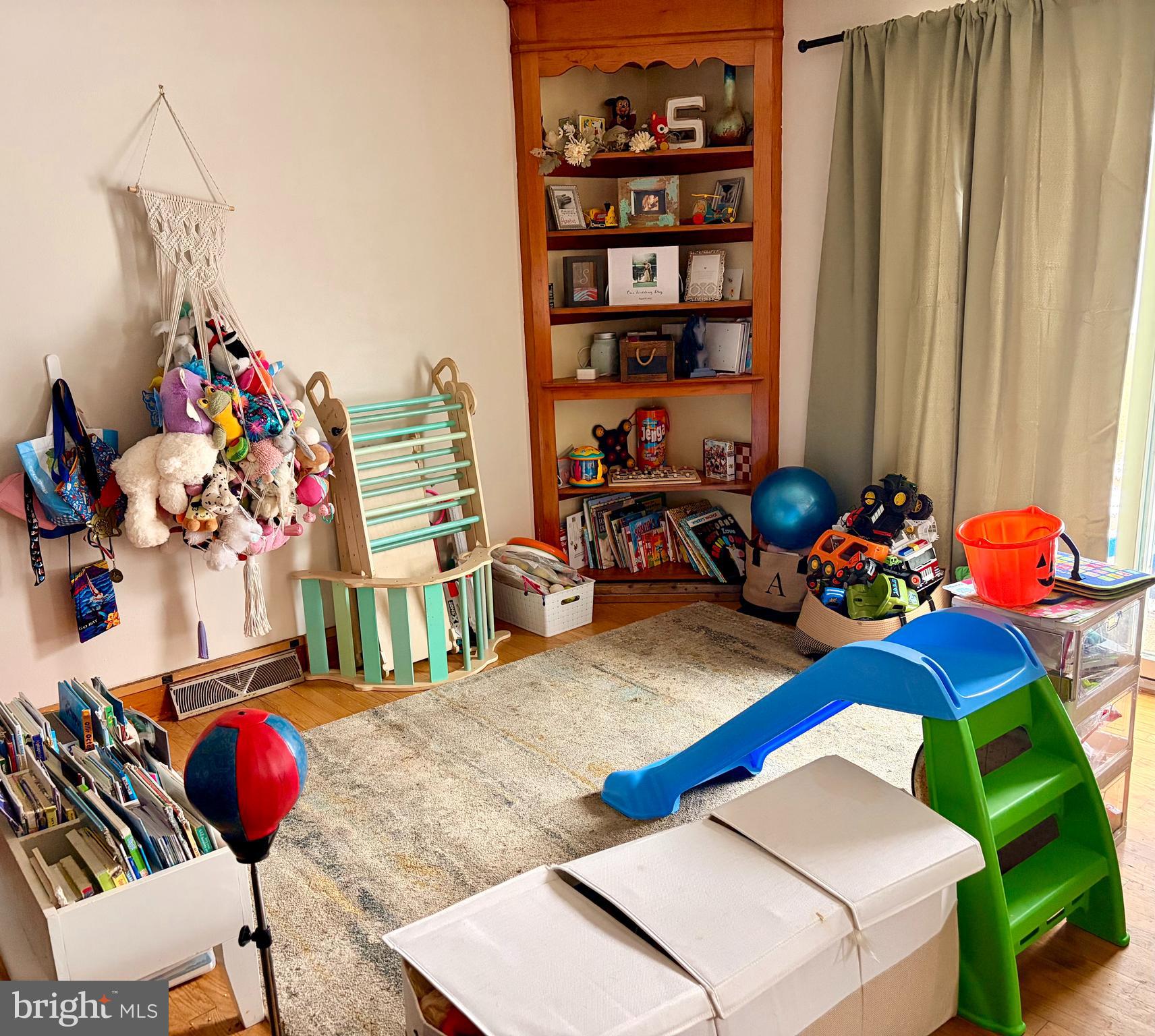 11905 Black Road Mercersburg, PA 17236 - Photo 2 of 9 a room with furniture toys and a large window