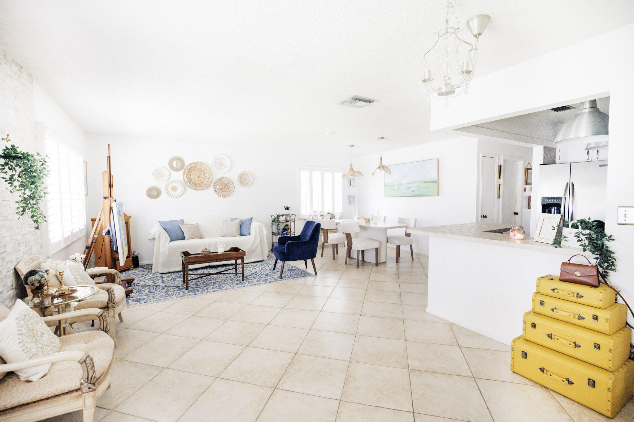 2403 Lowson Boulevard, Unit D Delray Beach, FL 33445 - Photo 6 of 21 a living room with furniture and a dining table with kitchen view