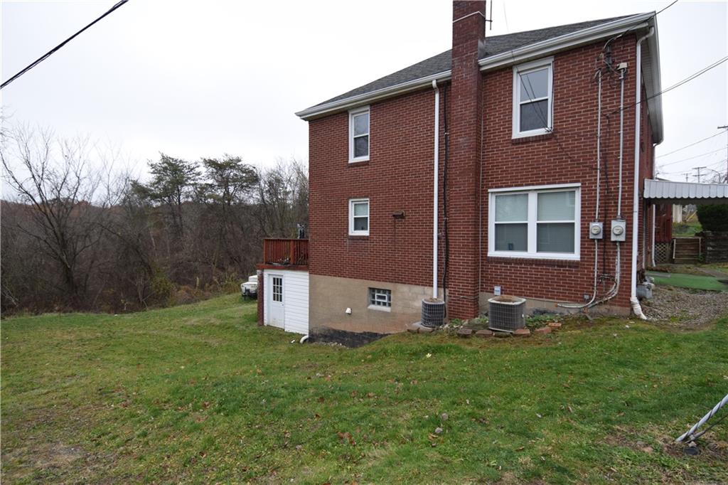 3224 Brodhead Road Aliquippa, PA 15001 - Photo 18 of 18 a view of a house with backyard