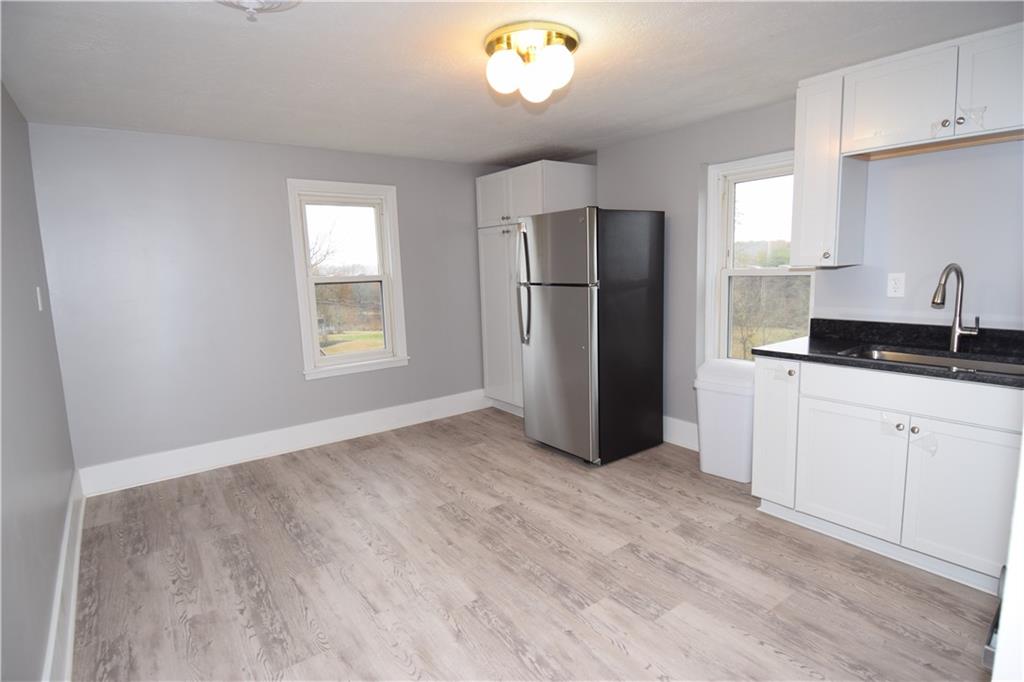 3224 Brodhead Road Aliquippa, PA 15001 - Photo 5 of 18 a kitchen with a refrigerator and a sink