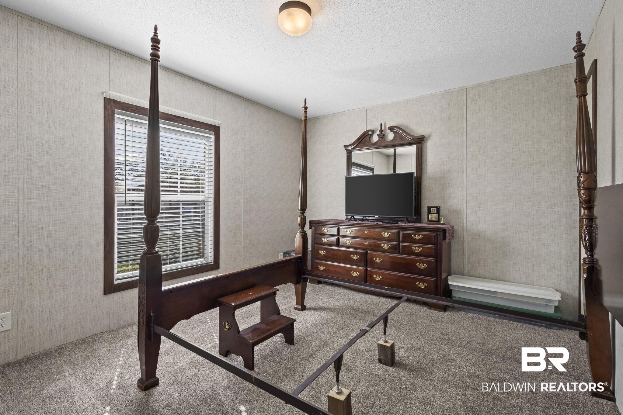 12960 7th Street Lillian, AL 36549 - Photo 23 of 25 Bedroom with carpet floors