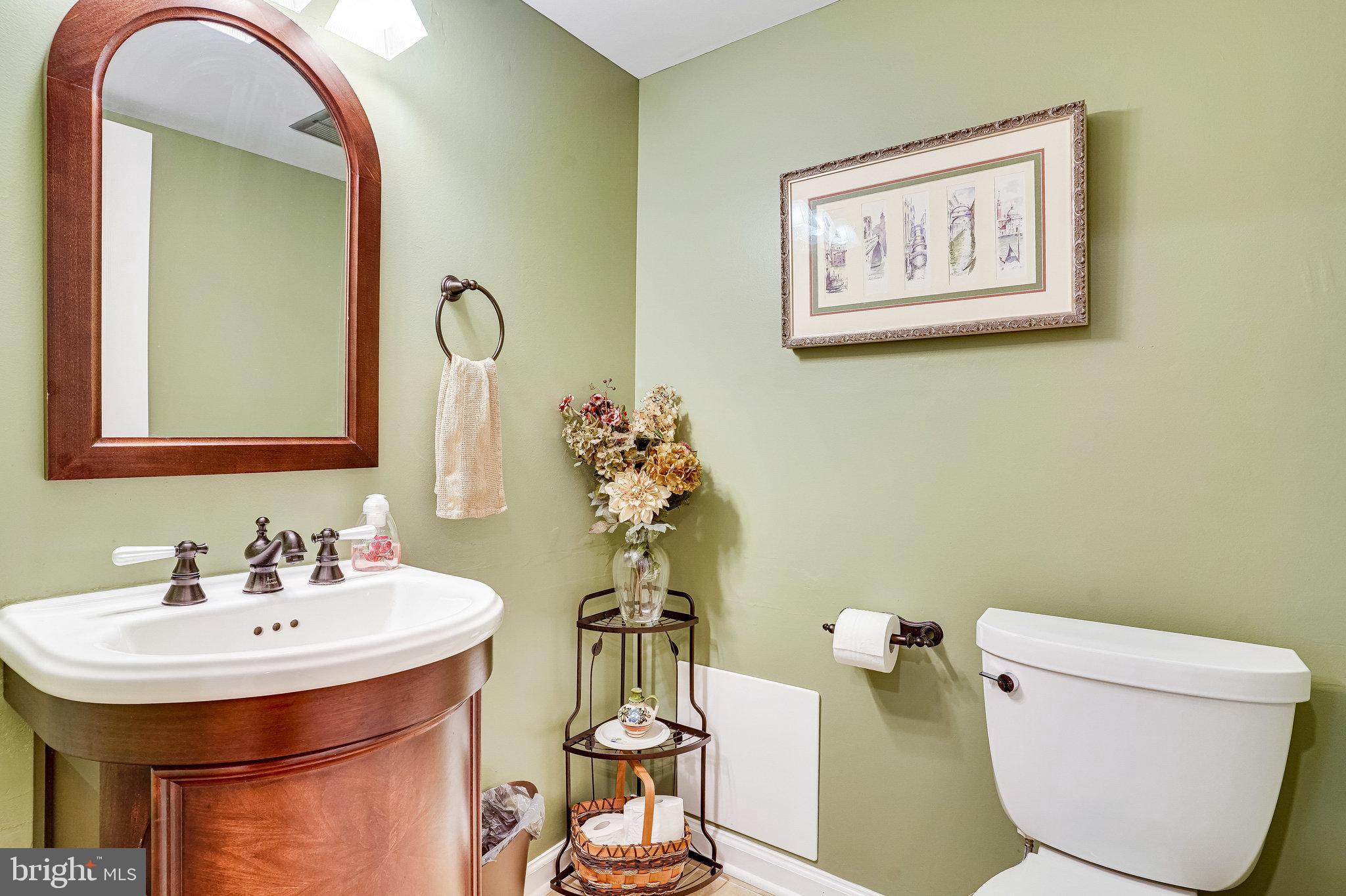 9141 Rockefeller Lane Springfield, VA 22153 - Photo 32 of 71 Main Level Powder Room between Kit & Family Rooms