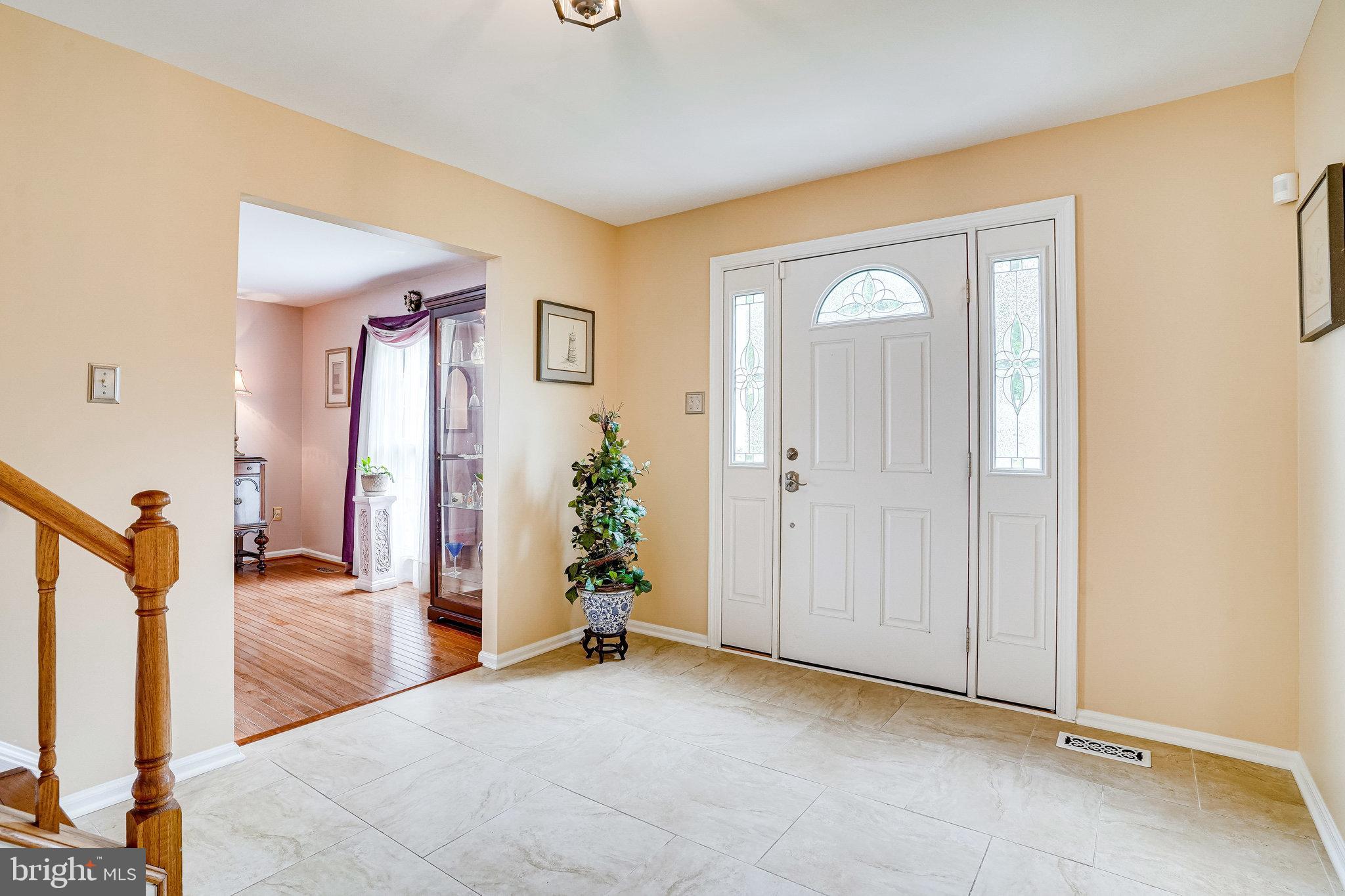 9141 Rockefeller Lane Springfield, VA 22153 - Photo 4 of 71 Entry Foyer - Custom Large Ceramic Tile