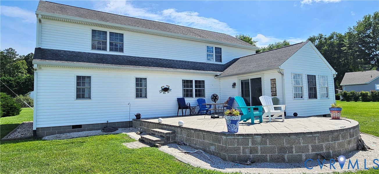 617 Sheepside Road Laneview, VA 22504 - Photo 3 of 9 Expansive rear stone patio with an integrated reta