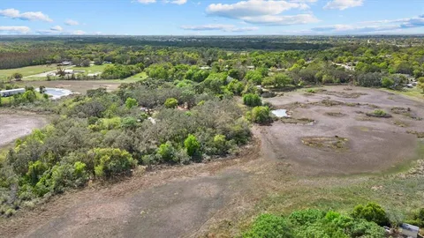 a view of a yard with an outdoor space