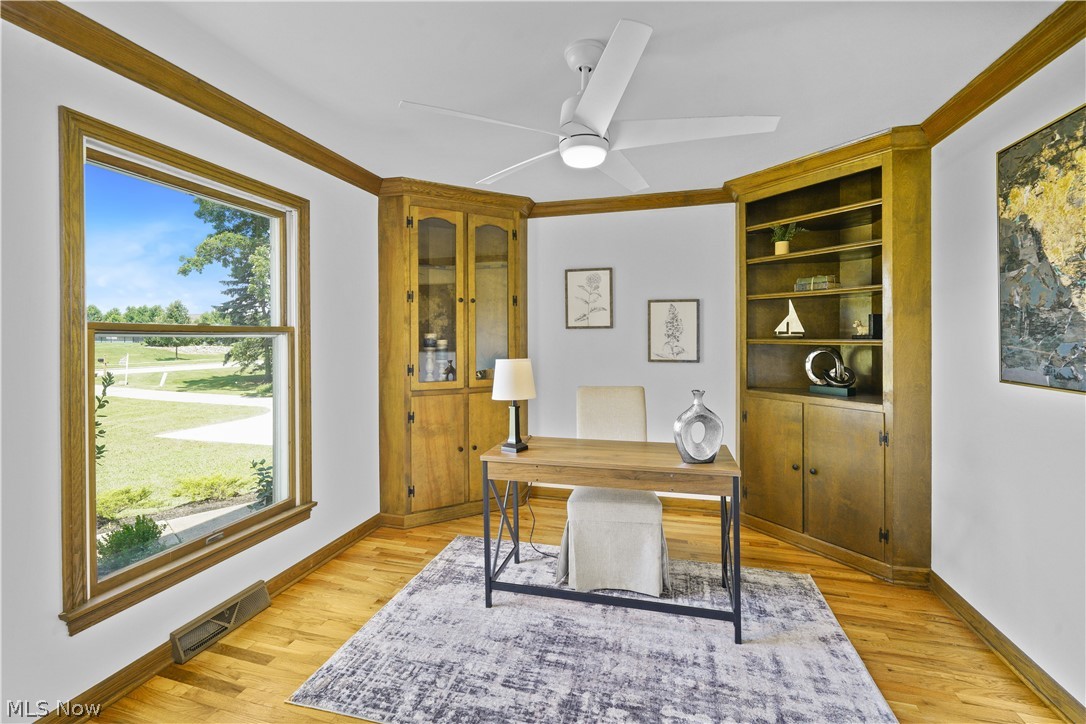 7231 Stow Road Hudson, OH 44236 - Photo 17 of 46 first floor home office with hardwood floors and built in cabinets.