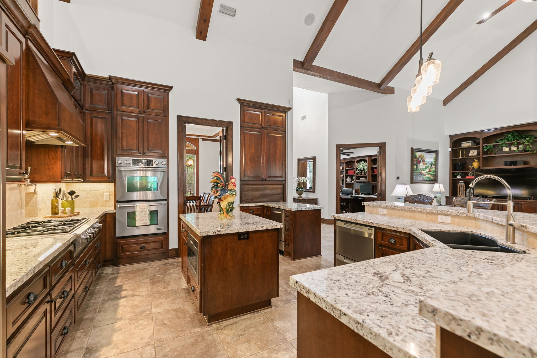15601 Brown Road Tomball, TX 77377 - Photo 12 of 48 a kitchen with granite countertop a sink stove and refrigerator