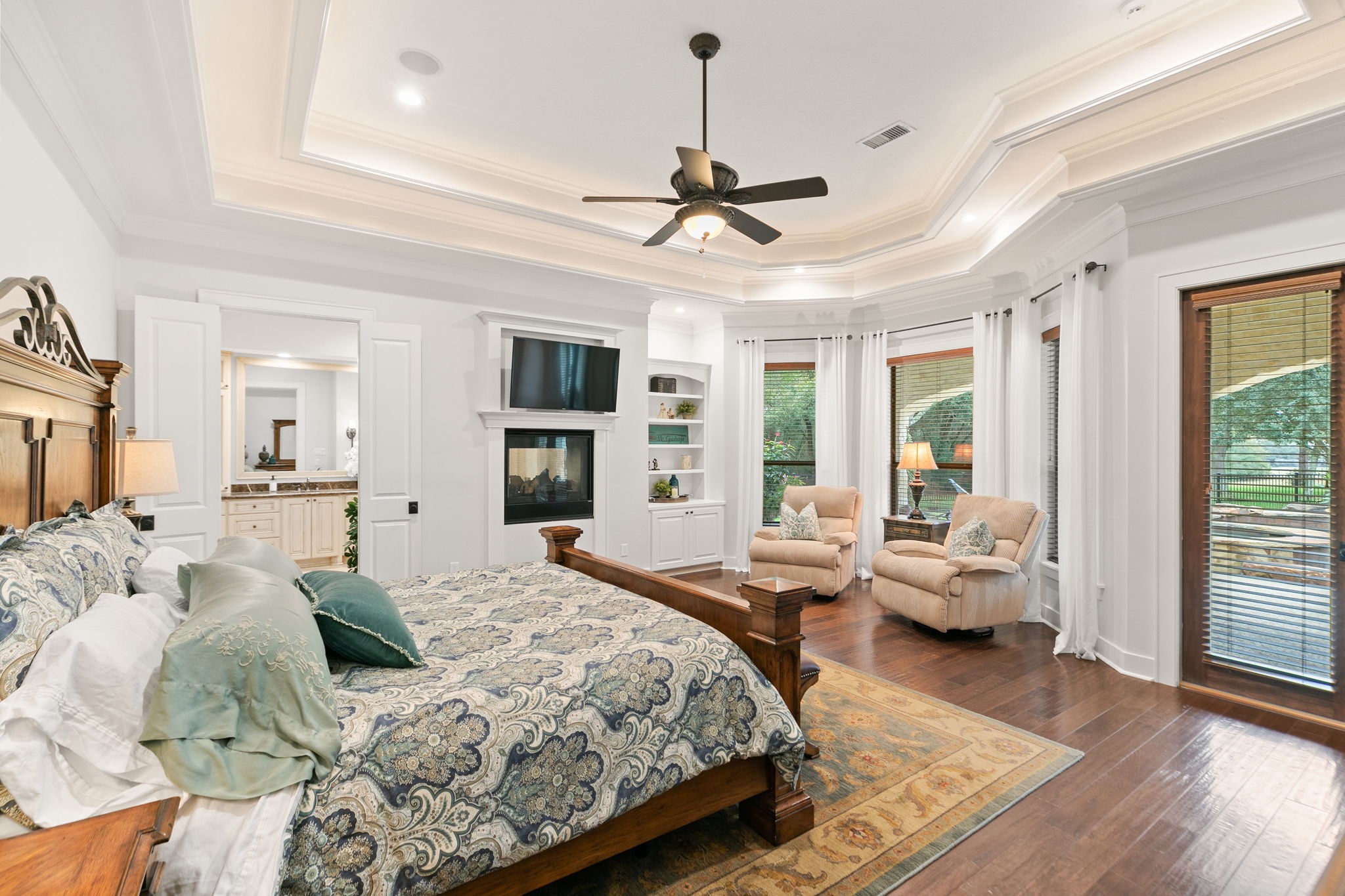 15601 Brown Road Tomball, TX 77377 - Photo 17 of 48 a bedroom with a large bed couch and a window