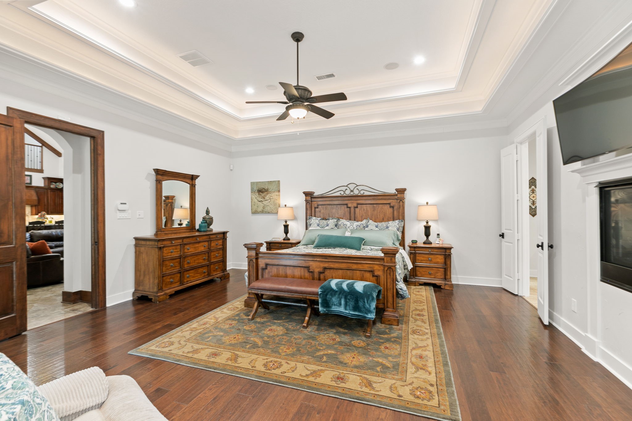 15601 Brown Road Tomball, TX 77377 - Photo 18 of 48 a living room with furniture and a flat screen tv