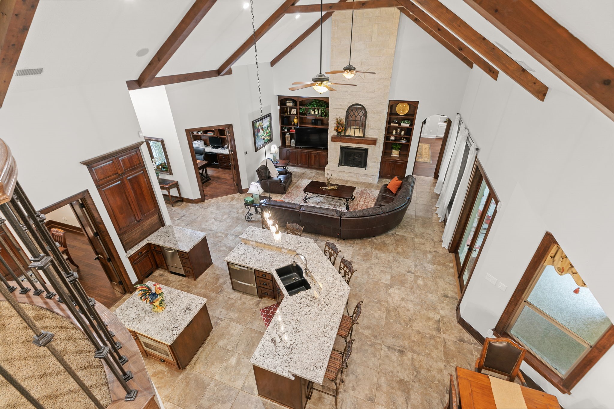 15601 Brown Road Tomball, TX 77377 - Photo 30 of 48 a living room with furniture and a fireplace