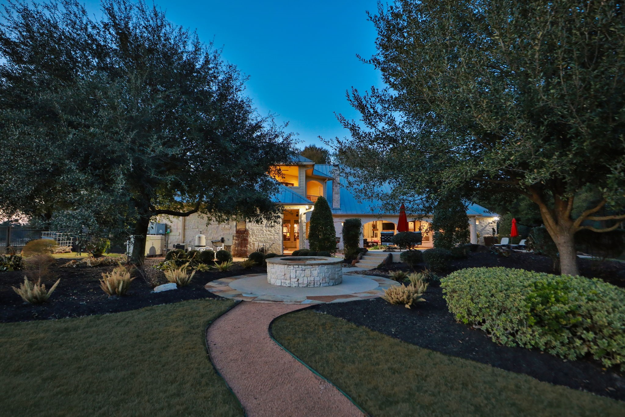 15601 Brown Road Tomball, TX 77377 - Photo 43 of 48 a front view of a house with a garden and trees