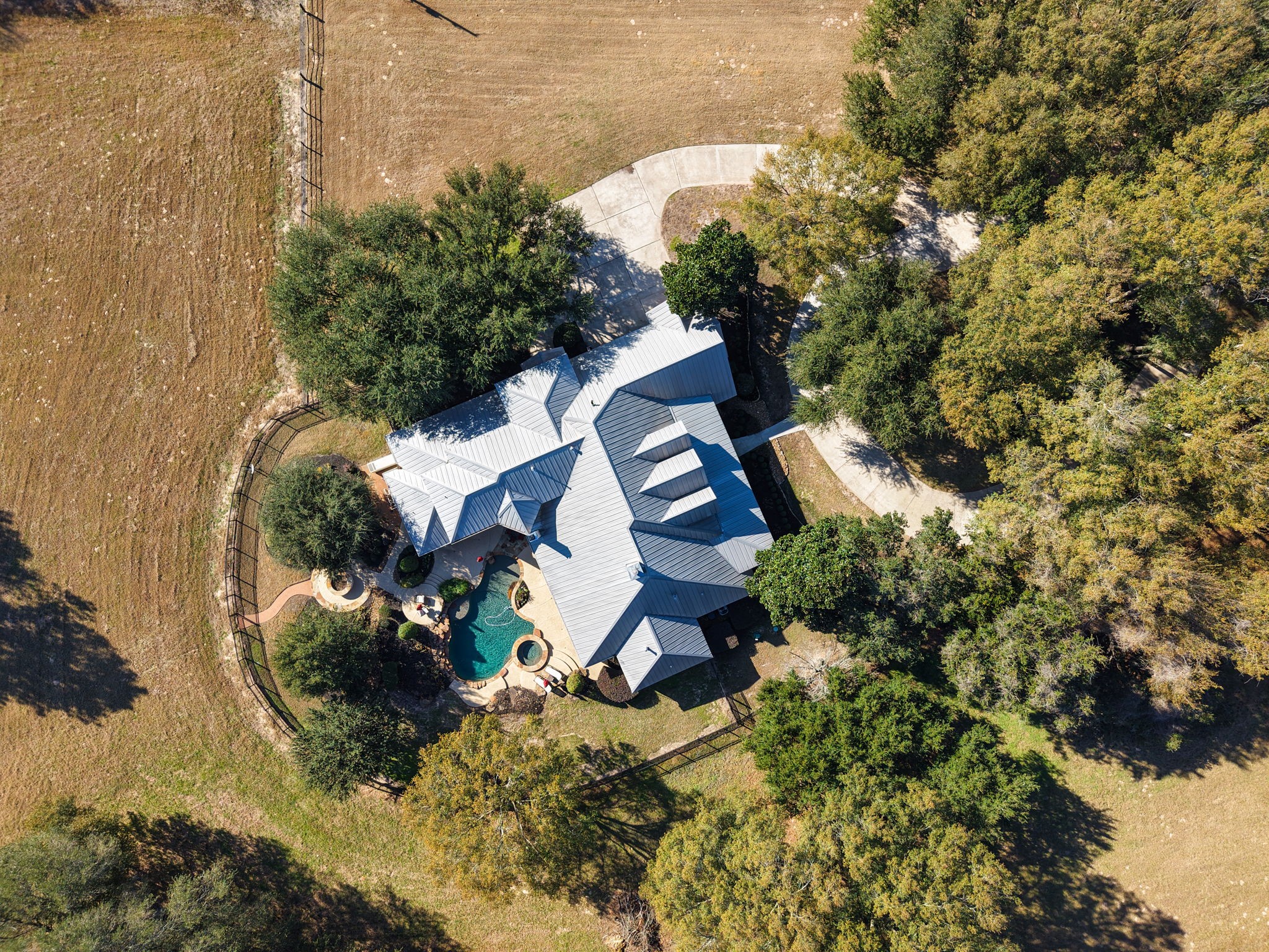 15601 Brown Road Tomball, TX 77377 - Photo 45 of 48 an aerial view of a house with a yard and lake view