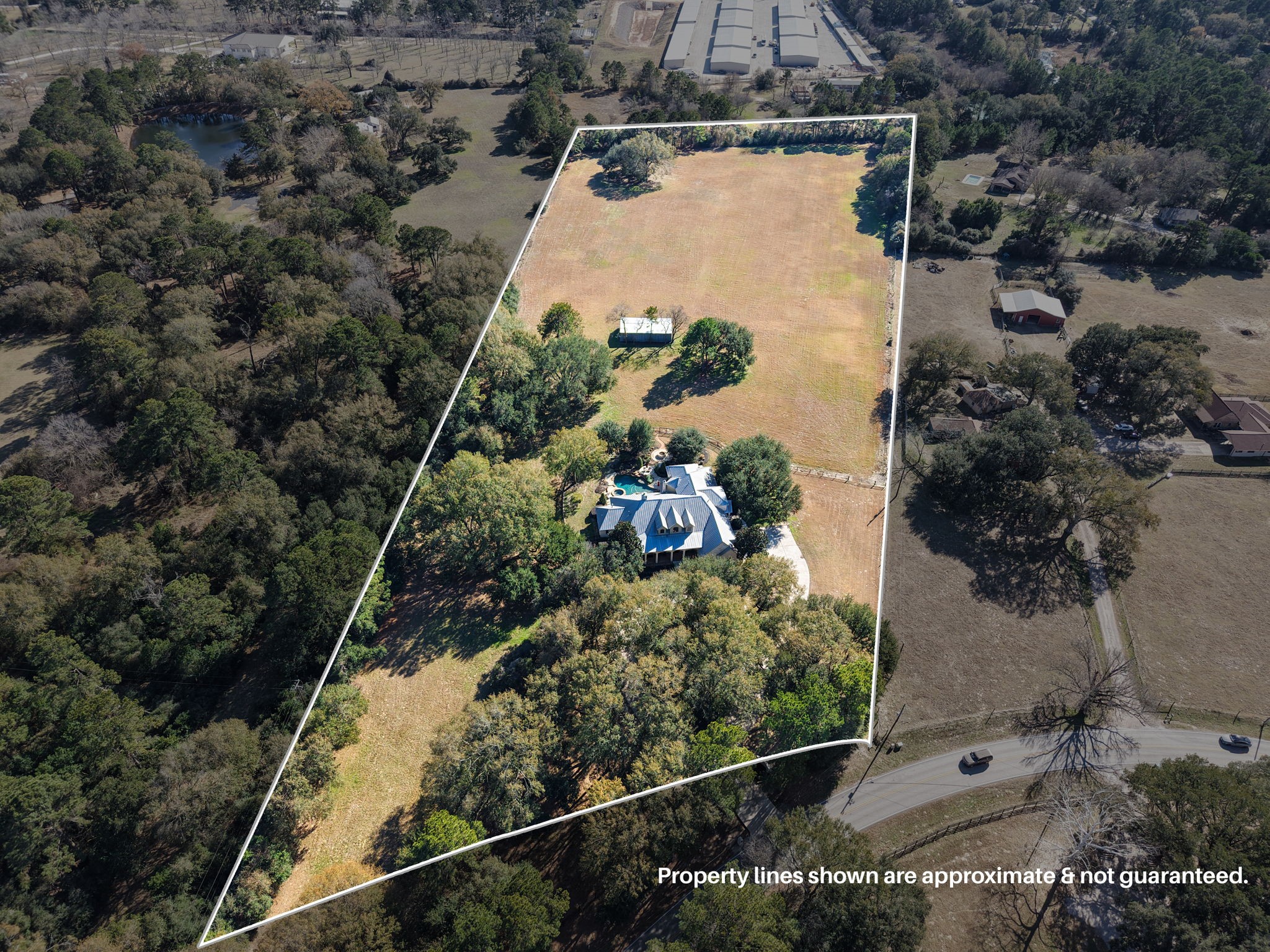 15601 Brown Road Tomball, TX 77377 - Photo 47 of 48 an aerial view of a house with a yard