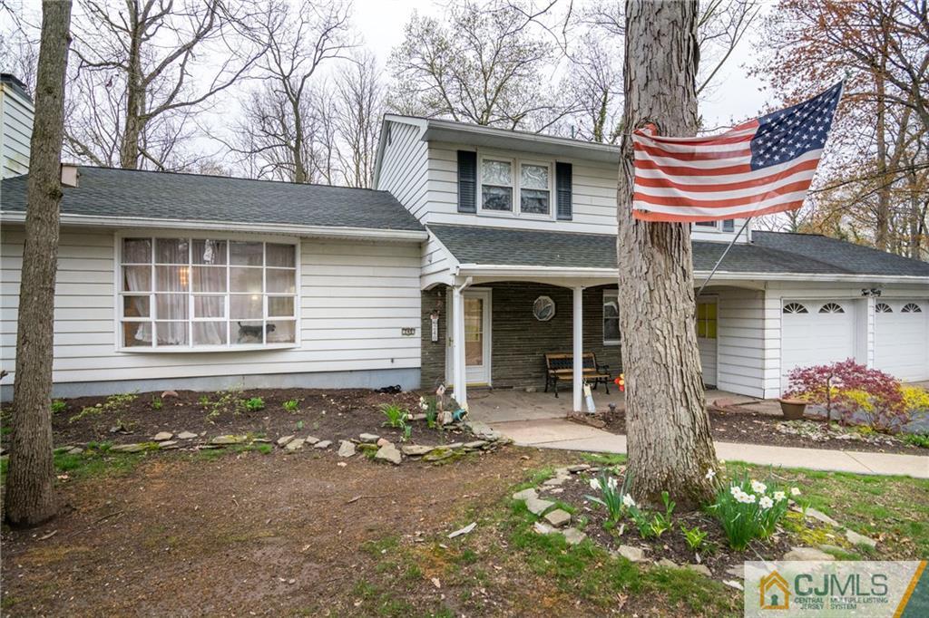 240 Hamlin Road North Brunswick, NJ 08902 - Photo 1 of 24 front view of a house with a yard